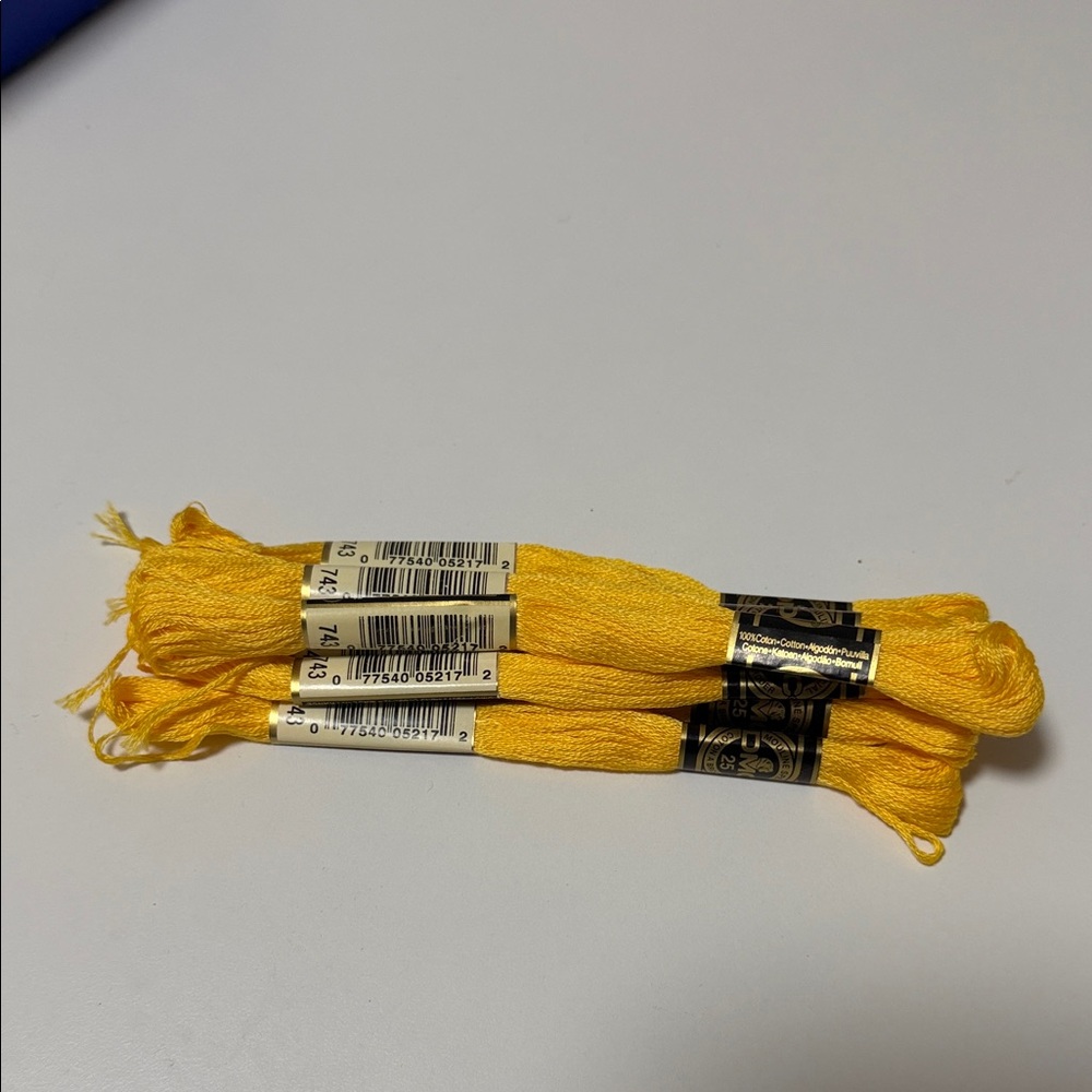 7 DMC (color 743) Bright Yellow Embroidery Floss